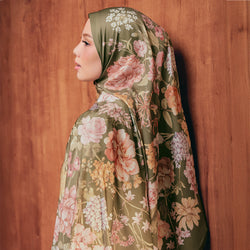 TudungPeople LE Heirloom olive print featuring intricate floral and leaf patterns on fabric.