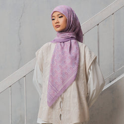 Colorful Pua Timpas print hijab by TudungPeople, featuring vibrant floral patterns on lightweight fabric.