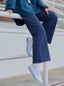Tummy-tuck pants by TudungPeople, high-waisted apparel designed to shape and smooth the waist and abdomen area.