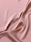 Elegant Inaya Satin TudungSignatures by TudungPeople, showcasing smooth fabric and stylish design in a close-up shot.