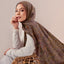 Colorful Ikatan Juwita print by TudungPeople, featuring vibrant, intricate designs on fabric for stylish hijab accessories.