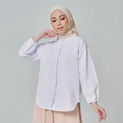 Pale lilac loose top by TudungPeople, casual apparel with a relaxed fit and soft fabric, shown on a hanger.