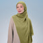 TudungPeople Signature Modal in Matcha fabric, showcasing a smooth, lightweight hijab with vibrant matcha green color.