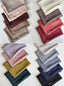 Elegant TudungPeople Modal Signatures fabric in soft, comfortable material with intricate signature-style patterns.