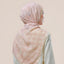 Colorful Ikatan Nyiur print by TudungPeople, showcasing intricate traditional textile patterns in vibrant colors.