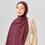 Niya Chiffon 2.0 instant hijab in Sangria color, lightweight chiffon fabric, styled in a flowing hijab look.