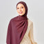Niya Chiffon 2.0 TudungInstant in Sangria color, lightweight chiffon hijab with soft drape, styled for everyday wear.