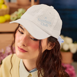 Soft meringue Sundaze Club Cap by TudungPeople, close-up view of the lightweight, stylish accessories designed for comfort and fashion.