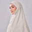 A white Aman Luxe Prayerwear by TudungPeople displayed flat, showcasing soft fabric and elegant design for modest prayer attire.