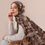 Atelier Umber print by TudungPeople featuring warm caramel tones on a textured background.
