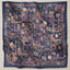Navy Atelier print hijab by TudungPeople featuring a dark blue square design with intricate patterns.