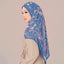 Blue Atelier print by TudungPeople showing intricate design on fabric with soft dusty blue tones.