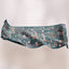 TudungPeople Atelier teal print design, showcasing vibrant teal fabric with intricate patterns, ideal for stylish headscarves.