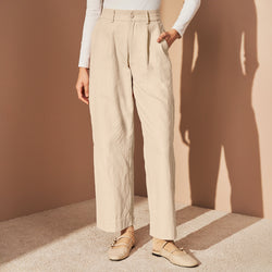 Cream field pants by TudungPeople, casual outdoor apparel with a relaxed fit and functional design.