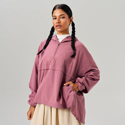TudungPeople flare parka in plum color, stylish women's apparel with a fitted waist and flared hem, perfect for chilly weather.