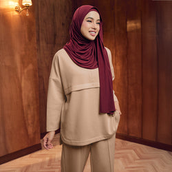 TudungPeople latte half-zip sweatshirt, cozy apparel with a high collar and zipper detail, front view, soft fabric texture.