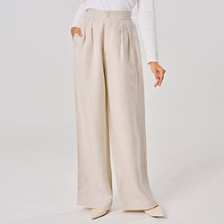 Light beige linen pants from TudungPeople, featuring a relaxed fit and natural fabric texture, perfect for casual wear.