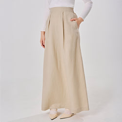 Oat-colored linen skirt from TudungPeople, casual women's apparel with a comfortable, relaxed fit and natural fabric texture.