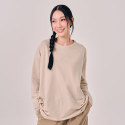 Oversized oatmeal-colored apparel top from TudungPeople, showcasing a relaxed fit and soft fabric.