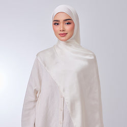 Raisa coconut signature tudung by TudungPeople featuring a stylish hijab with elegant design and vibrant coconut color.
