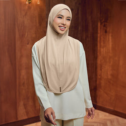 TudungPeople Safaa Basic instant in Chamomile, showing a modest hijab style with soft fabric and neutral beige color.