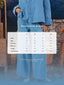 Medium blue denim wide pants from TudungPeople, showing the relaxed fit and waistband detail.