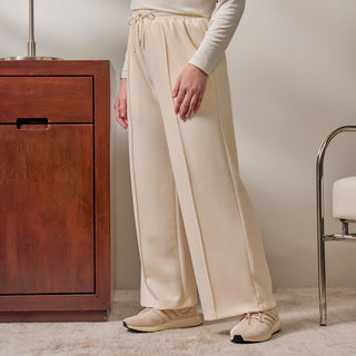 Off White TudungPeople sweatpants, casual apparel with a relaxed fit, featuring a comfortable waistband and stylish design.