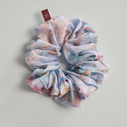 Light blue Wilderness Scrunchie from TudungPeople accessories collection, showcasing soft fabric and elastic hair tie.