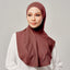 Active Najwa Sport Wave in copper by TudungPeople, showing the stylish copper-colored hijab with wave design in a close-up shot.