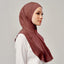 Najwa Sport Wave active hijab in copper color by TudungPeople, shown in a close-up image highlighting the fabric and design details.