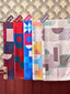 Colorful print artwork by TudungPeople featuring vibrant floral designs on a decorative print piece.