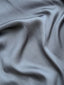 Elegant Leia Satin Signatures hijab by TudungPeople featuring smooth satin fabric and signature design, shown in a stylish drape.